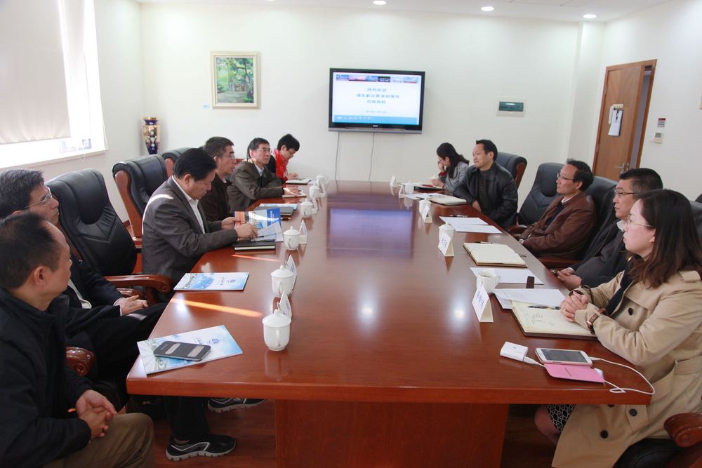 浦东新区教育局副局长王浩一行来访