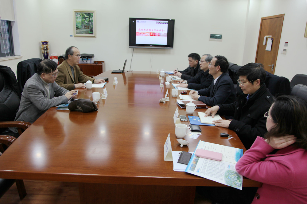 上海现代服务业联合会会长周禹鹏一行来校调研指导